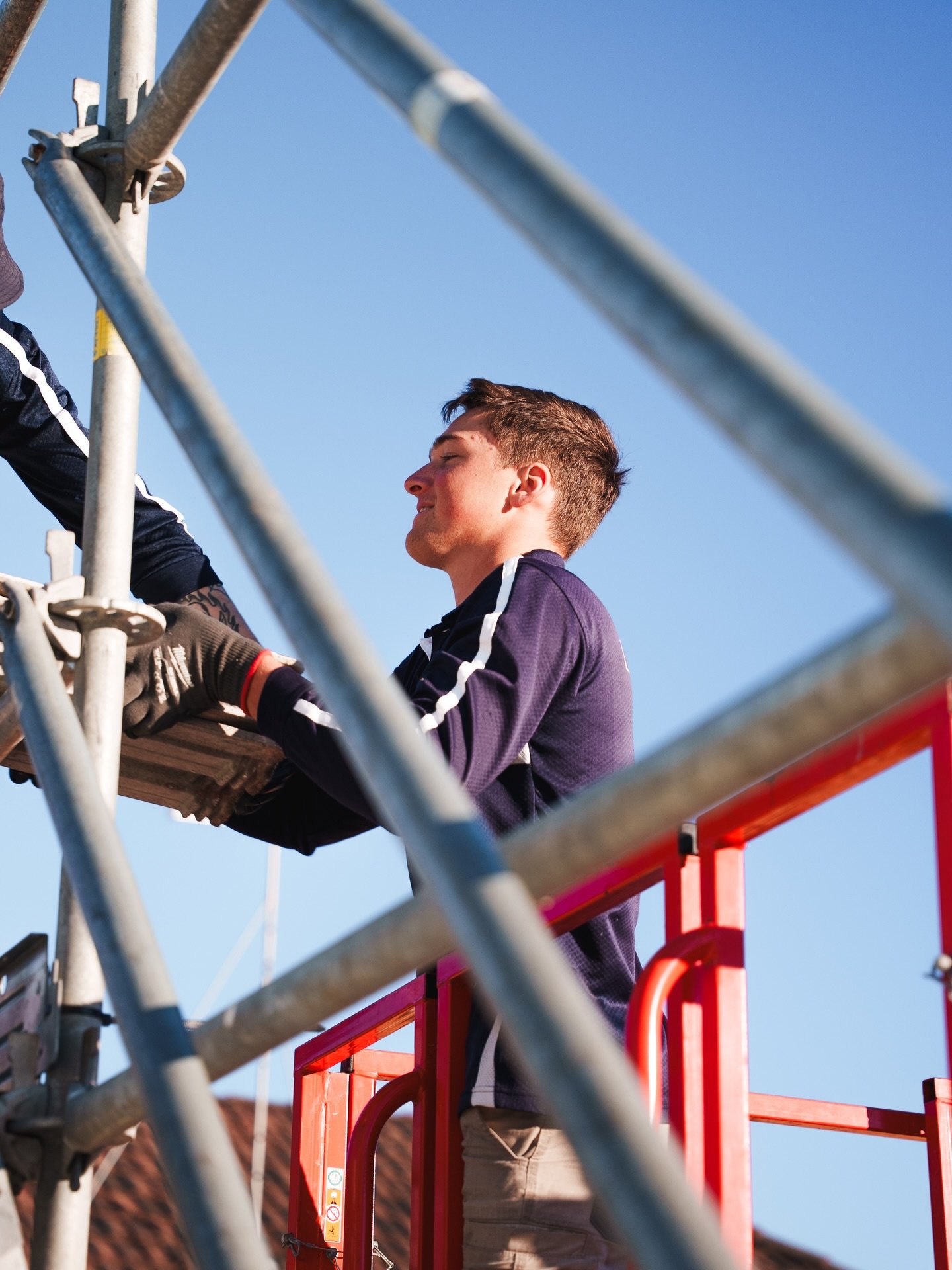 Ridgeline Roof Works professional inspecting a roof